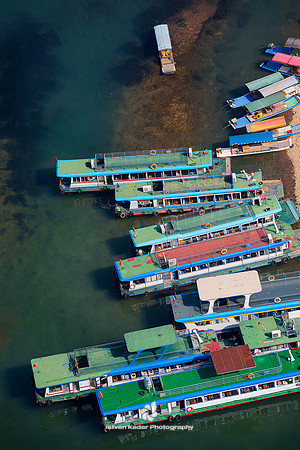 Tour-boats along Li River, Yangshuo, Guangxi, China