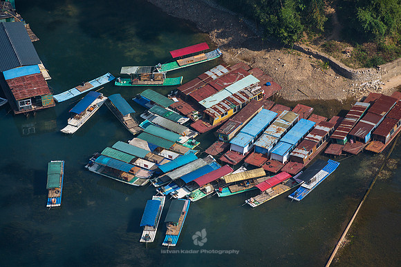 Tour-boats along Li River, Yangshuo, Guangxi, China