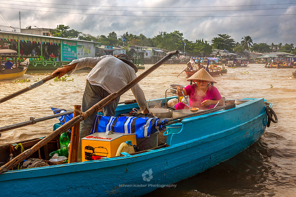 Market Vendors on Vessel at Floating Market in Mekong Delta, Vie