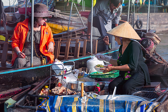 Market Vendors on Vessel at Floating Market in Mekong Delta, Vie