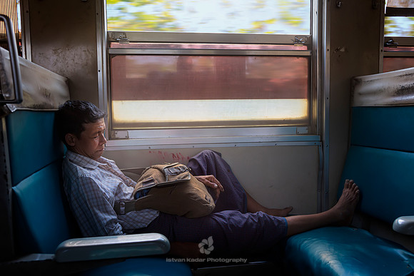 Sleeping Man on Yangon's Circular Train, Myanmar