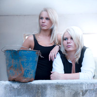 blonde, bucket, cognate, girls, kibble, pail, sisters, together, women, portrait, "two people" lights, window, "looking out"