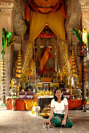 Worshiper at Angkor Wat